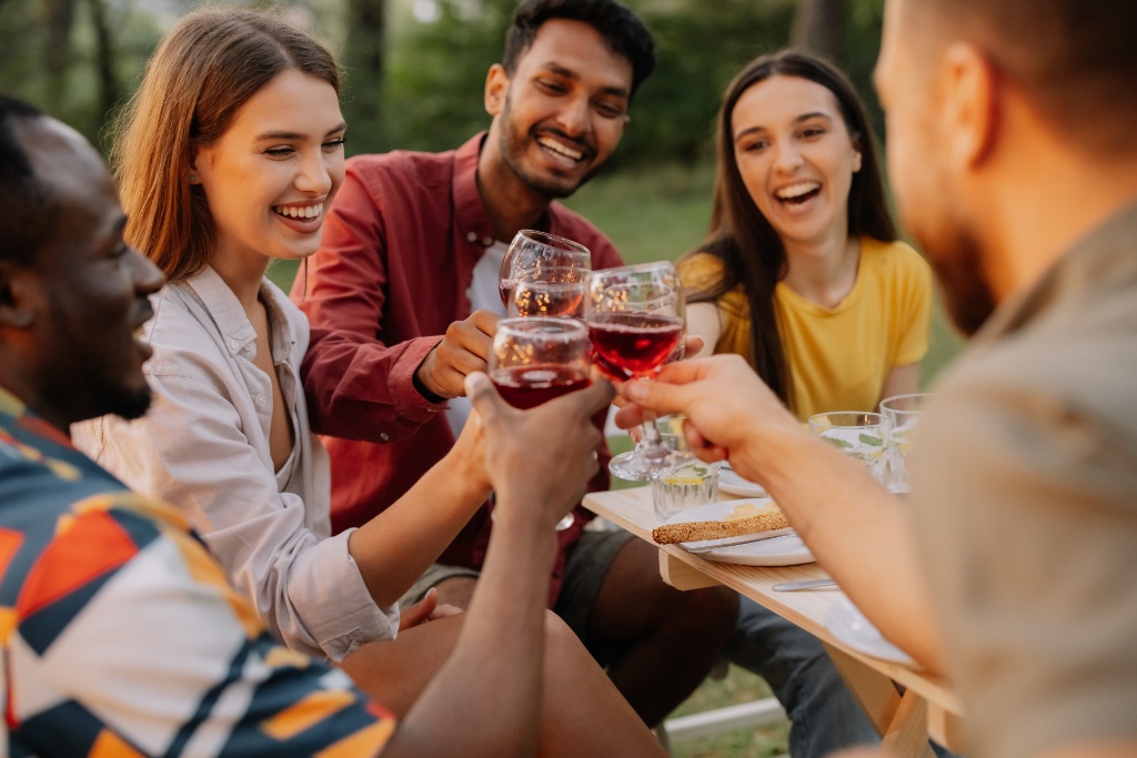 friends toasting with wine glasses
